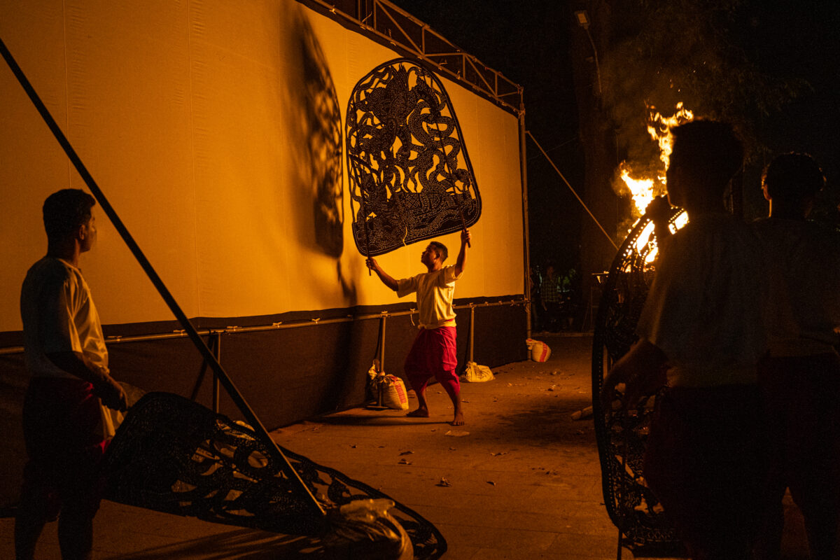 Cambodian artists perform a Khmer shadow puppet during an art festival in Siem Reap, Cambodia, to attract visitors after the country eases Covid-19 travel restrictions.