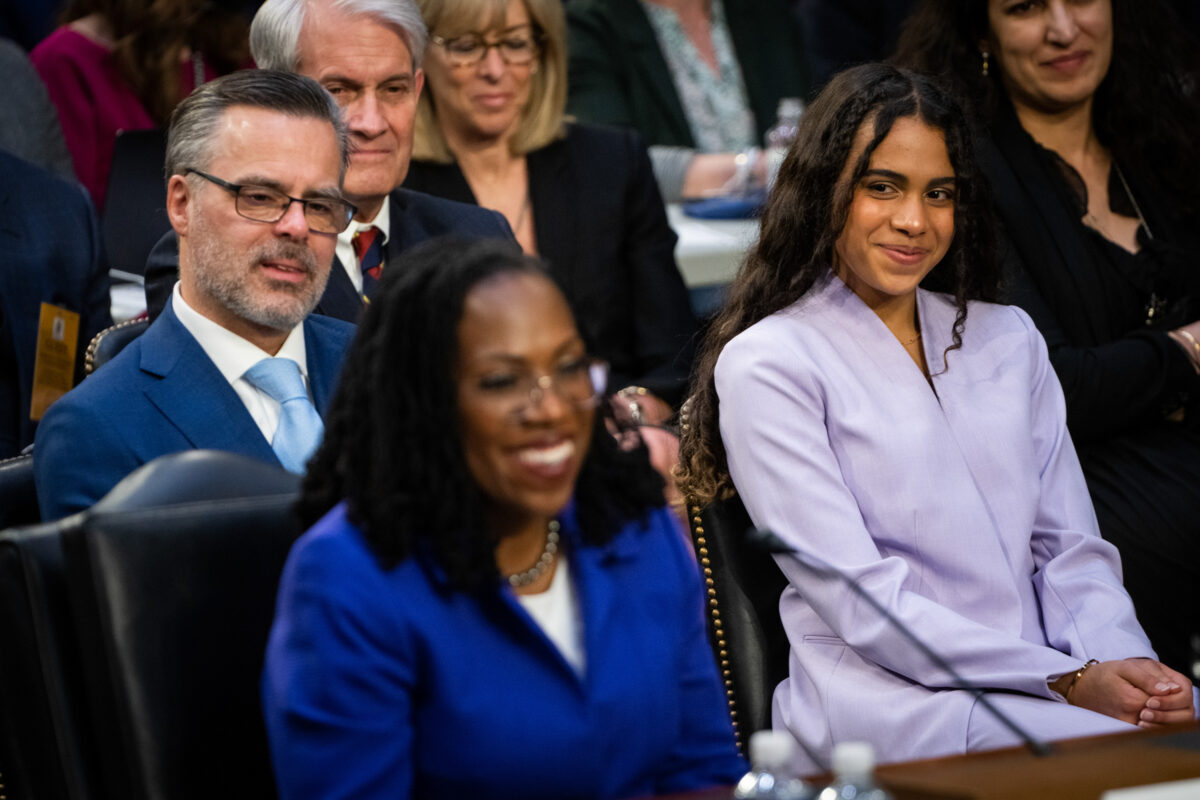 Leila Jackson, 17, right, looks toward her mother, Supreme Court nominee Judge Ketanji Brown Jackson, while seated by her father Patrick Jackson during day one of confirmation hearings at the Hart Senate Office Building in Washington, DC on Monday, March 21, 2022.